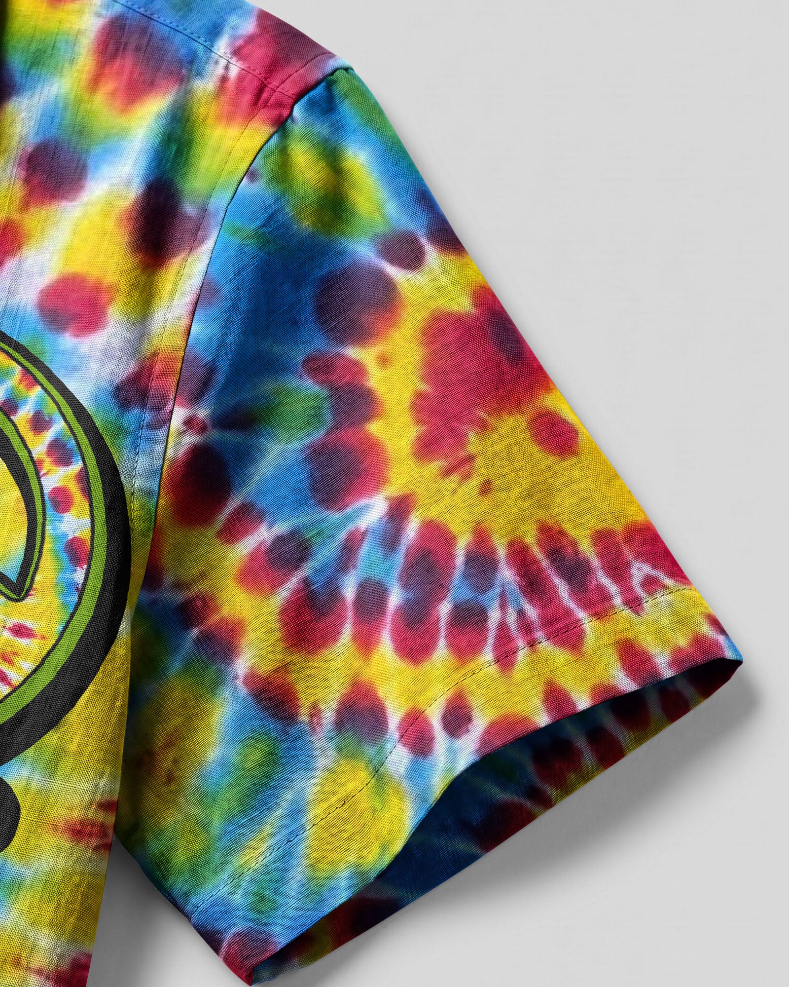 Hippie Peace Love Flowers Tie Dye Camp Shirt Lifestyle shot of a person wearing the hippie peace love flowers tie dye camp shirt at a summer festival, radiating good vibe