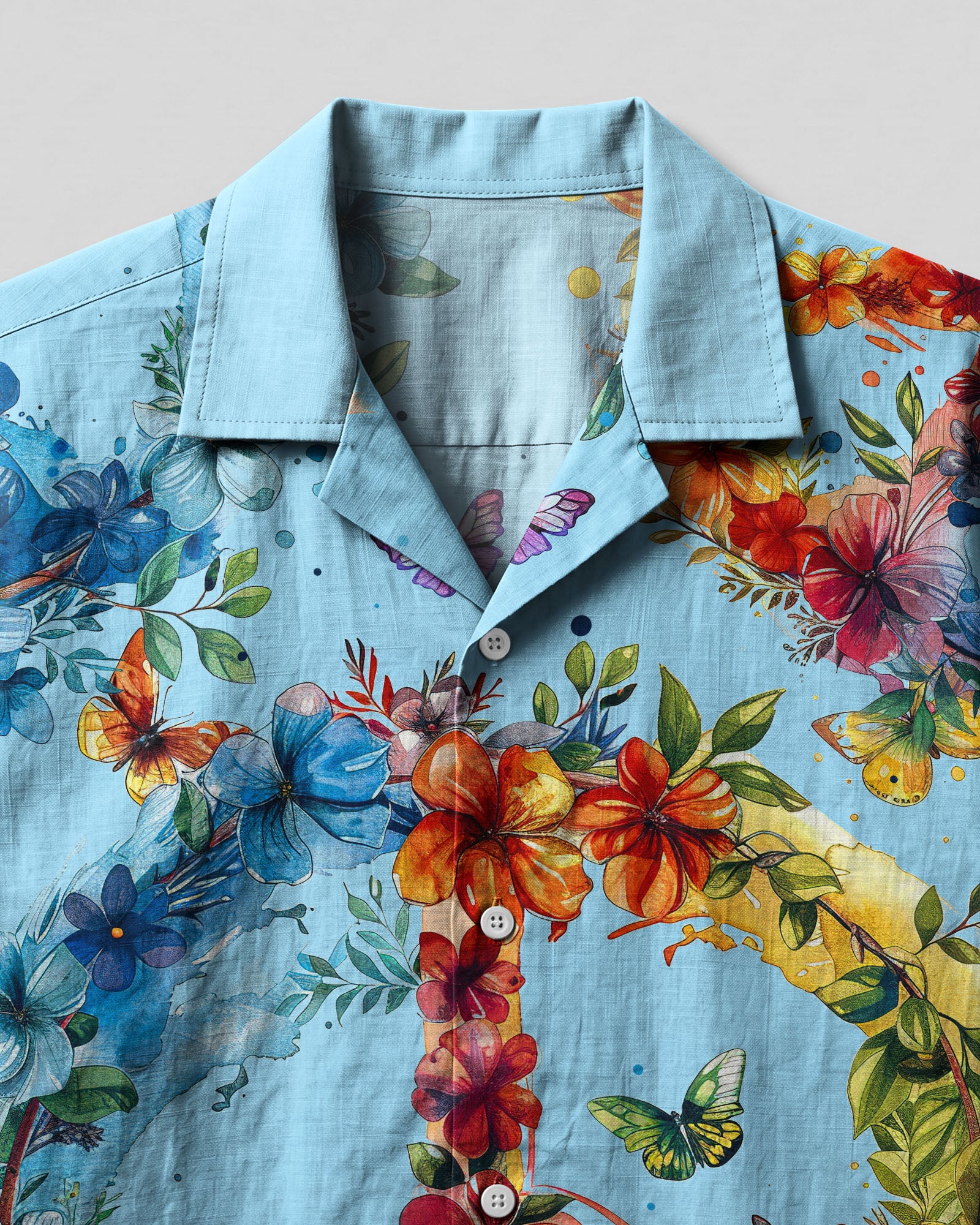 Peace Symbol Floral Camp Shirt Close-up detail of the peace symbol floral camp shirt highlights intricate floral designs and colorful butterflies.