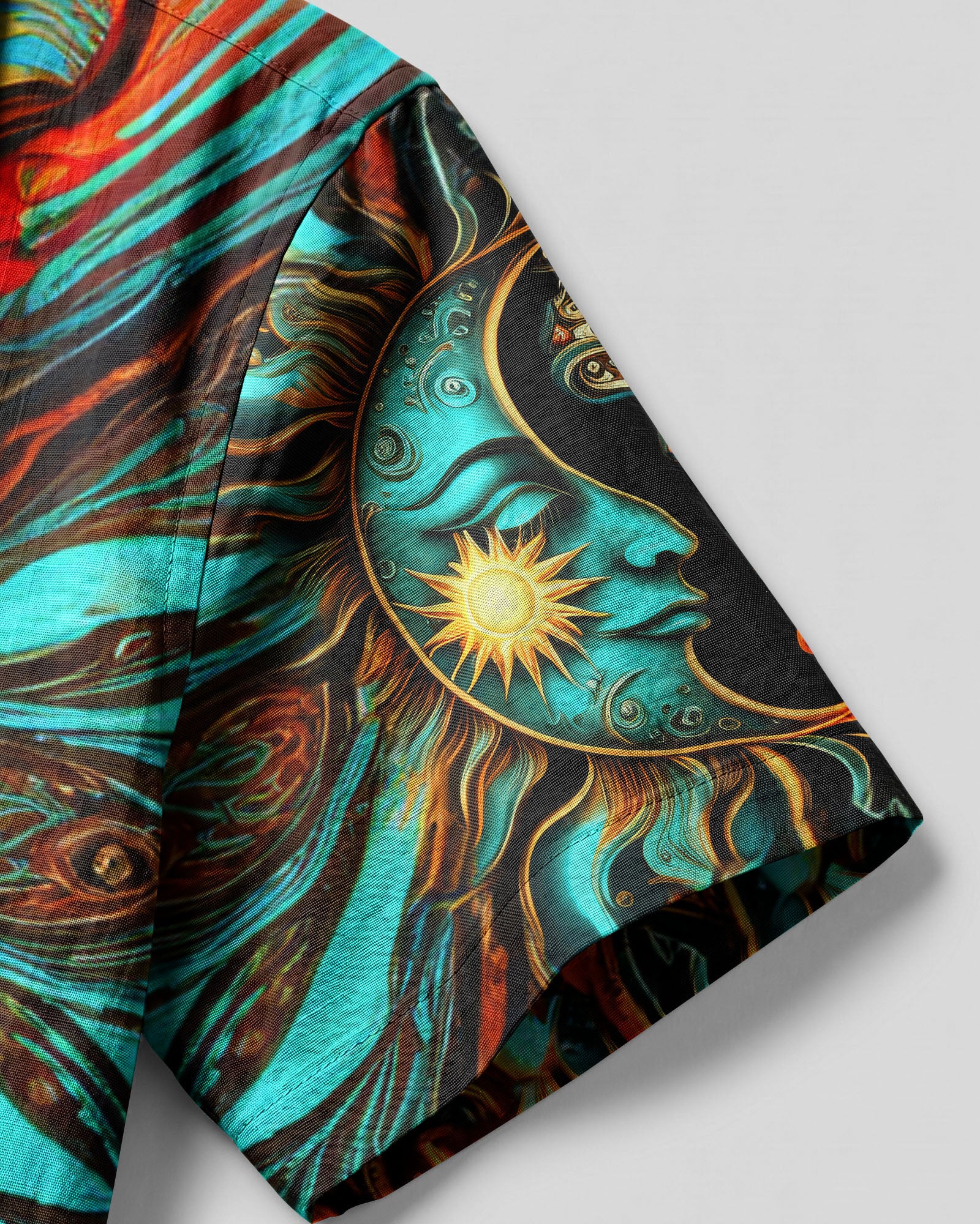 Sun and Moon Artistic Camp Shirt Lifestyle shot of the sun and moon artistic camp shirt worn at a beach, emphasizing its artistic flair and vibrant style.