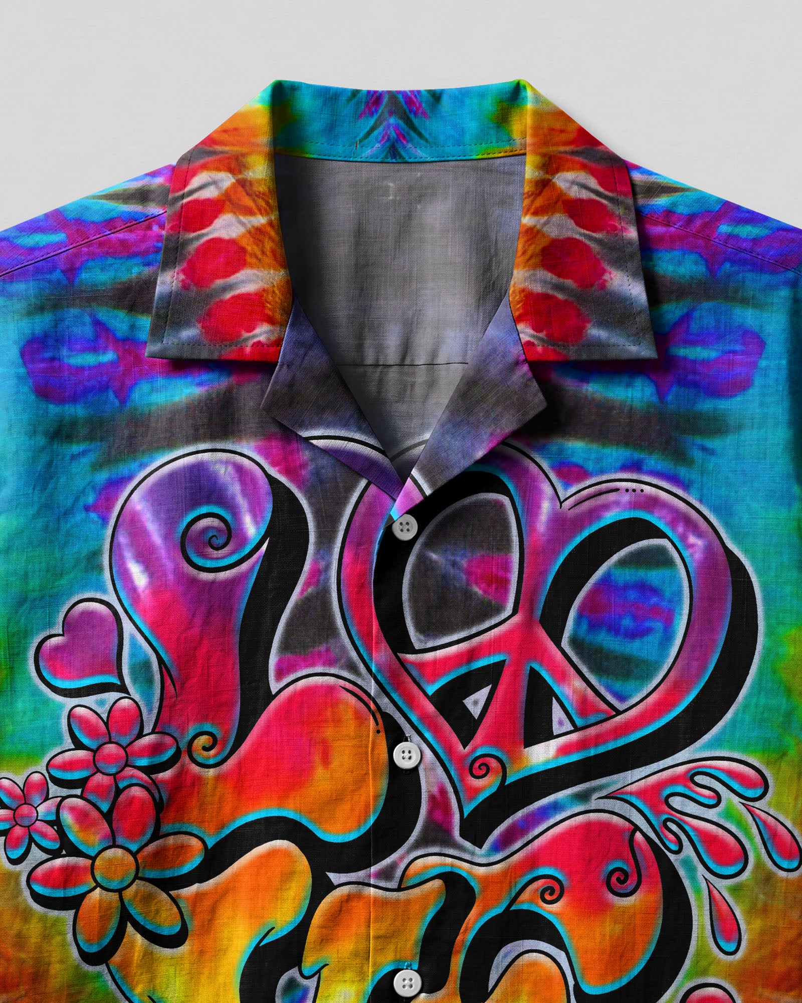 Love Tie Dye Camp Shirt Close-up detail of the love tie dye camp shirt highlighting the unique fabric texture and graphic elements.