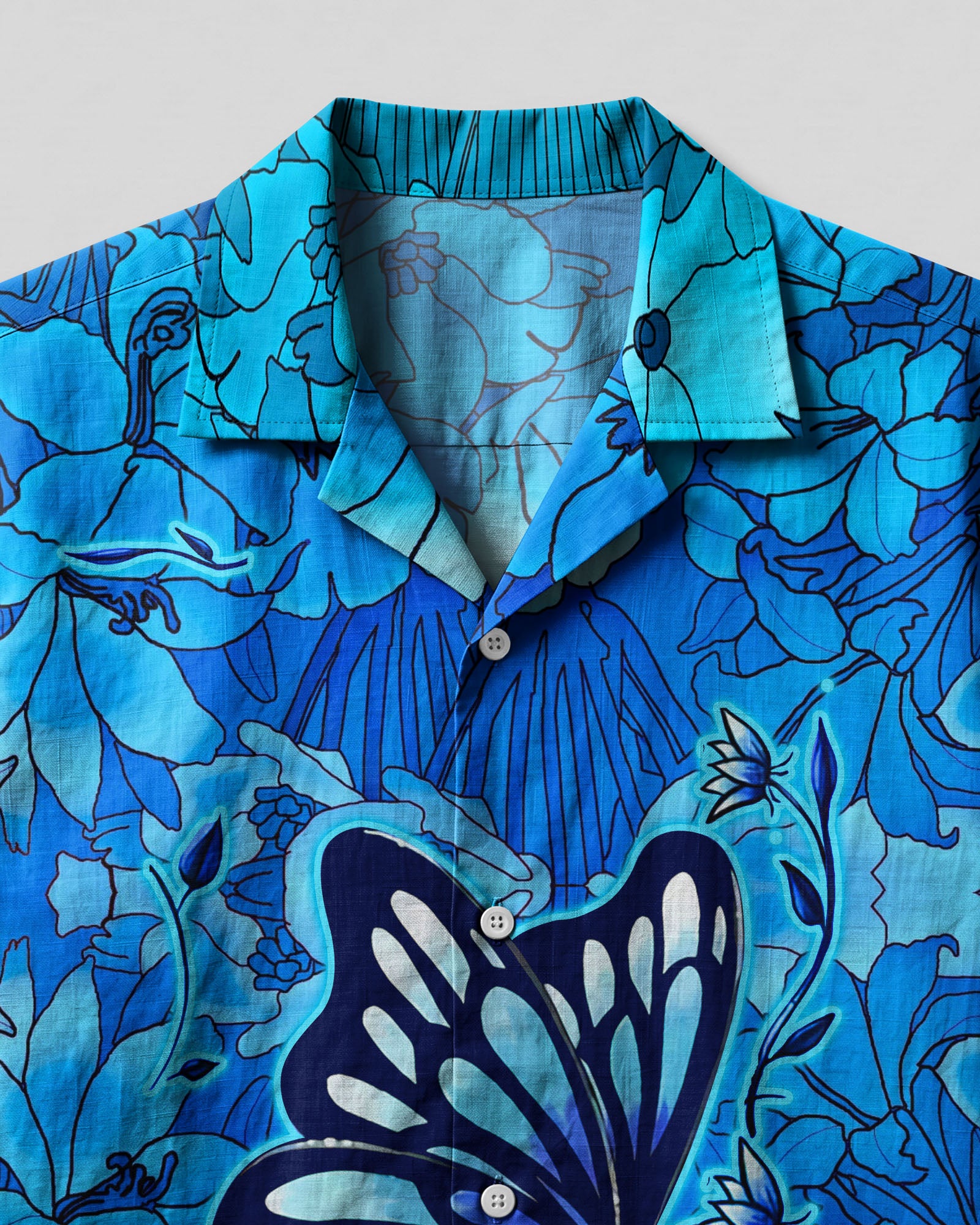 Whisper Words Of Wisdom Camp Shirt Close-up detail of the fabric texture and butterfly print on the Whisper Words Of Wisdom Camp Shirt.