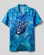 Front view of the blue Whisper Words Of Wisdom Camp Shirt featuring a butterfly and floral design.