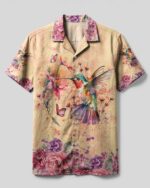 Front view of the Just Breathe Hummingbird Camp Shirt with vibrant floral and hummingbird design.