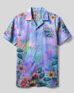 Front view of the running against the wind camp shirt featuring vibrant floral designs in soft pastel colors.