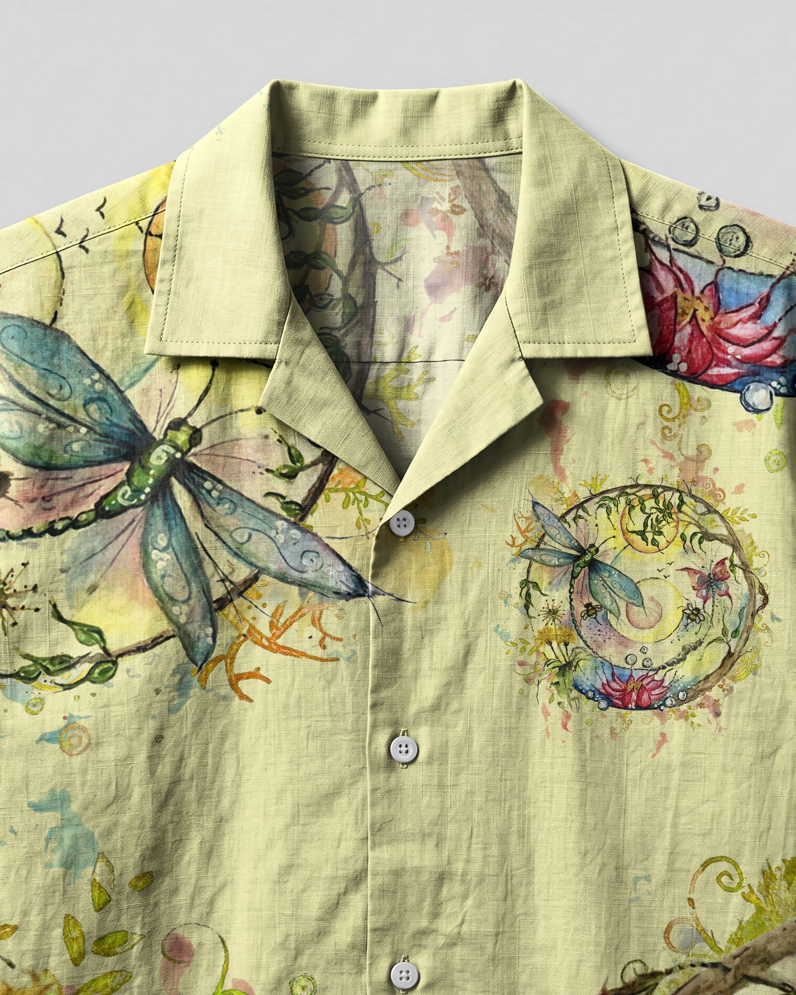 Spirit Of A Fairy Dragonfly Camp Shirt Close-up detail of the spirit of a fairy dragonfly camp shirt featuring colorful dragonflies and floral elements in vivid hue