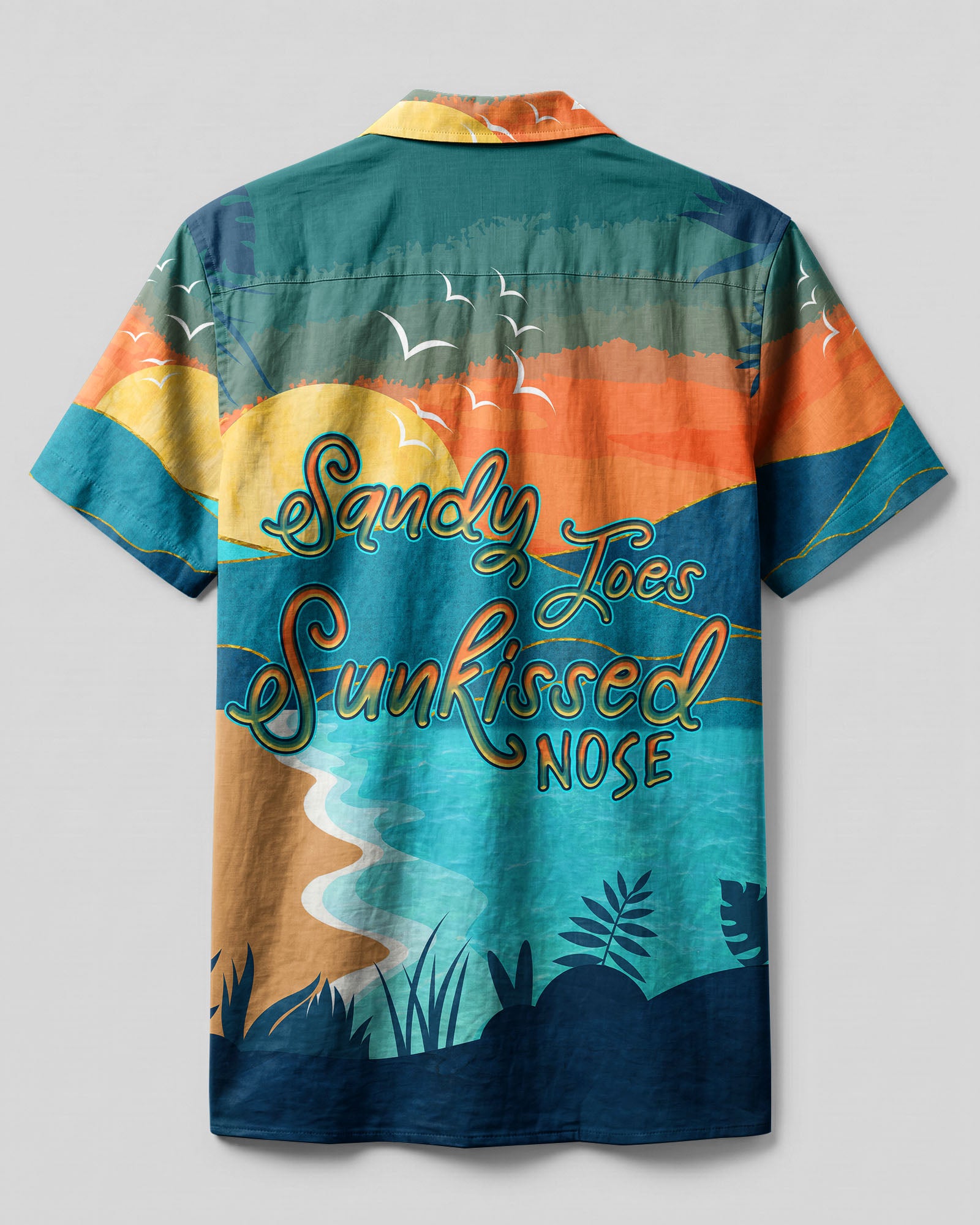 Sandy Toes Sunkissed Nose Camp Shirt Back view of the sandy toes sunkissed nose camp shirt featuring a colorful landscape with waves and mountains.