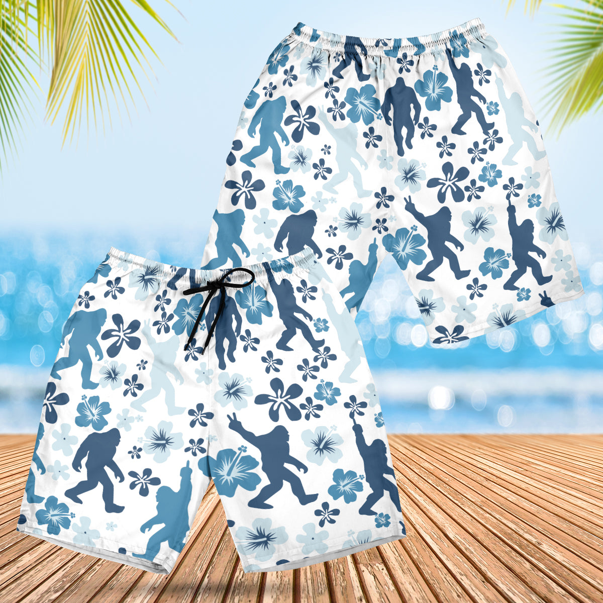 Bigfoot Hibiscus Blue Hawaiian Shirt Front view of a folded funny Bigfoot hibiscus blue Hawaiian shirt, showcasing its colorful design.