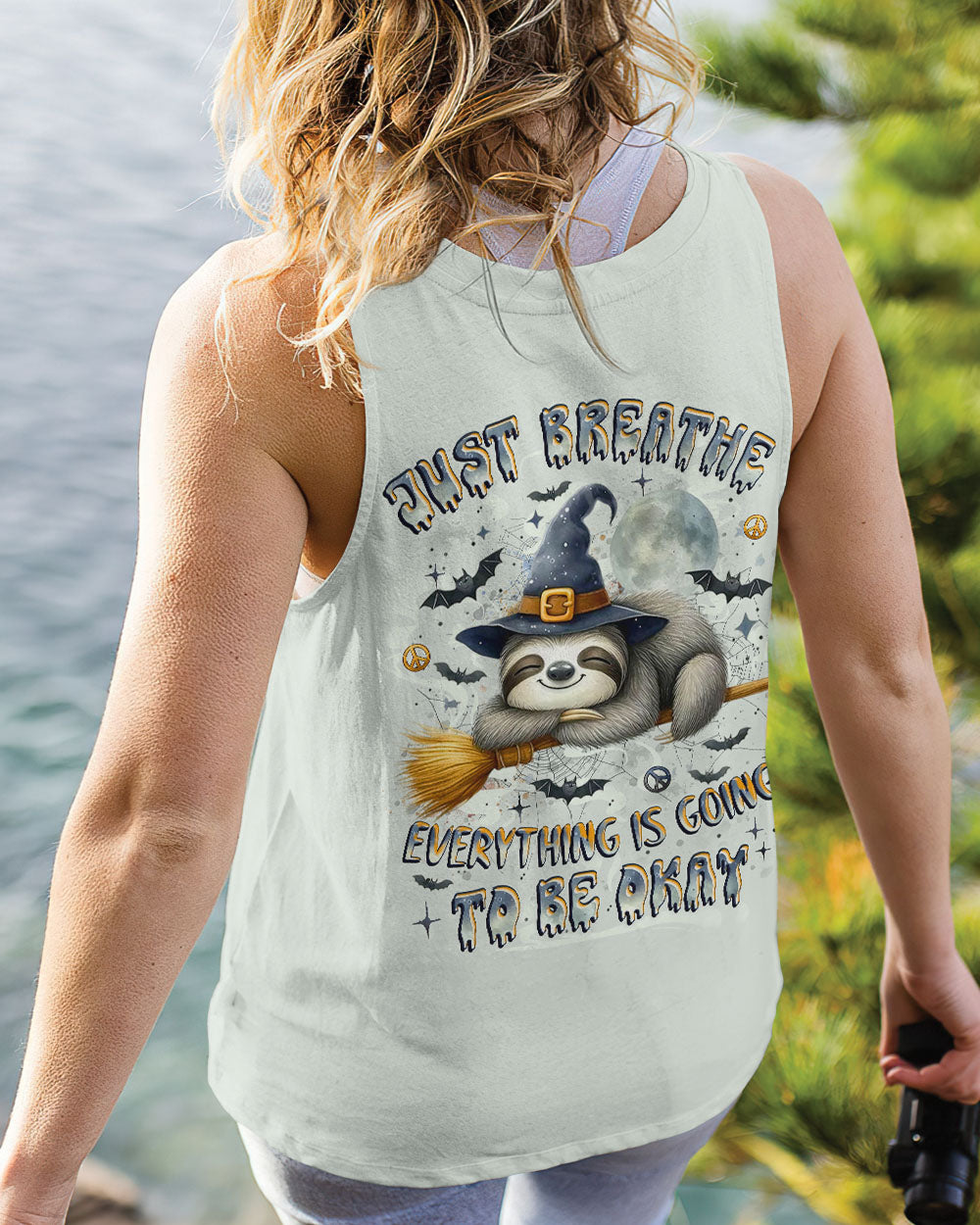 Just Breathe Sloth Witch Halloween Shirt Detailed view of the just breathe sloth witch shirt's fabric, highlighting quality print and comfortable material.