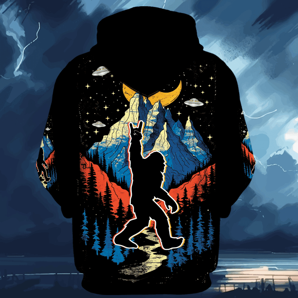 Bigfoot Mountain Night Hawaiian Shirt Model wearing the Bigfoot Mountain Night Hawaiian Shirt at a beach party, perfect for summer vibes.