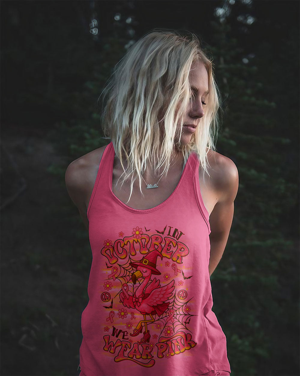 Pink Flamingo Witch Shirt | All Over Print Clothes Casual wear of the pink flamingo witch shirt during a breast cancer awareness event, promoting unity.