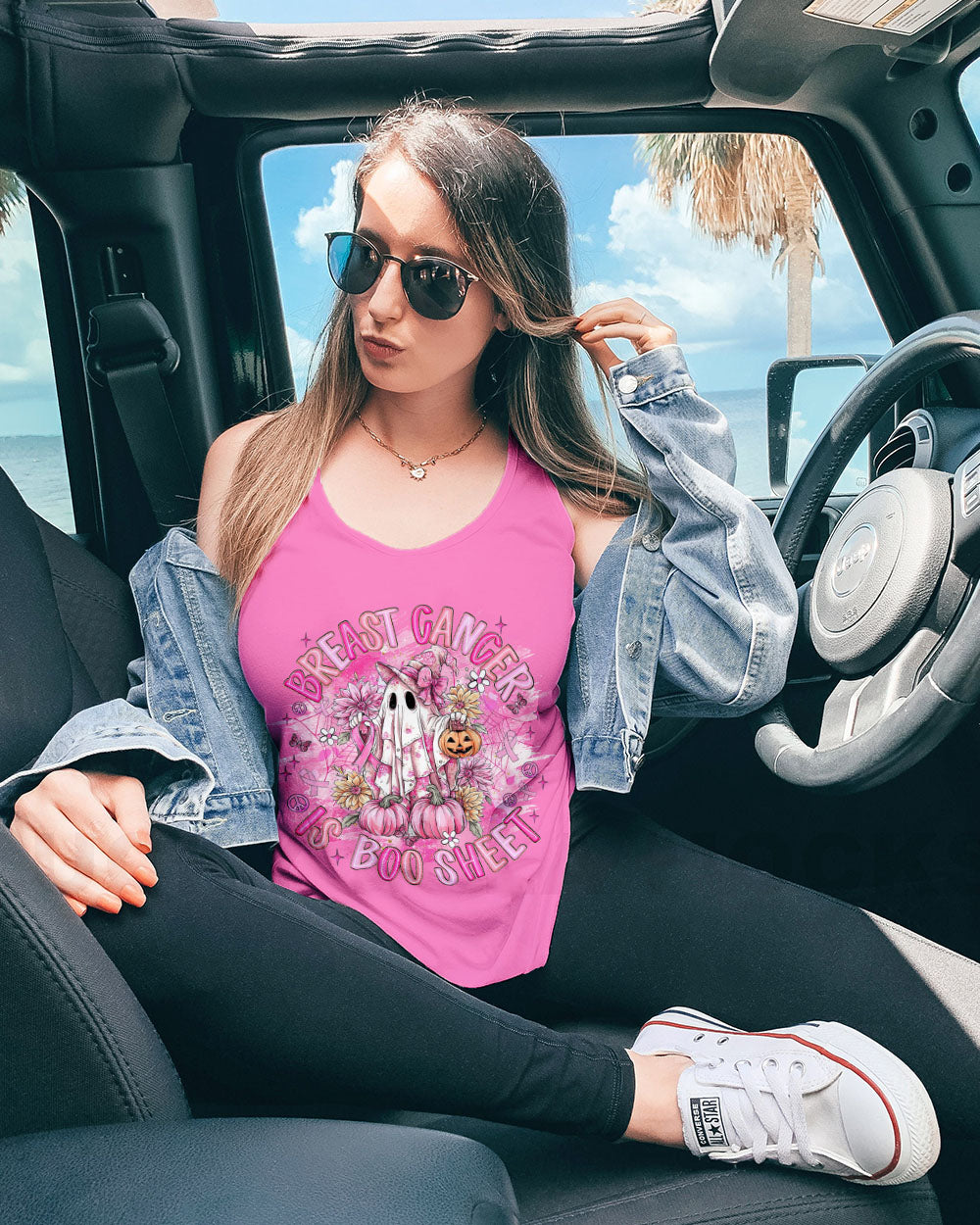 Breast Cancer Is Boo Sheet Shirt | All Over Print Detailed view of the breast cancer is boo sheet shirt's sleeve, featuring fun designs that complement the theme.