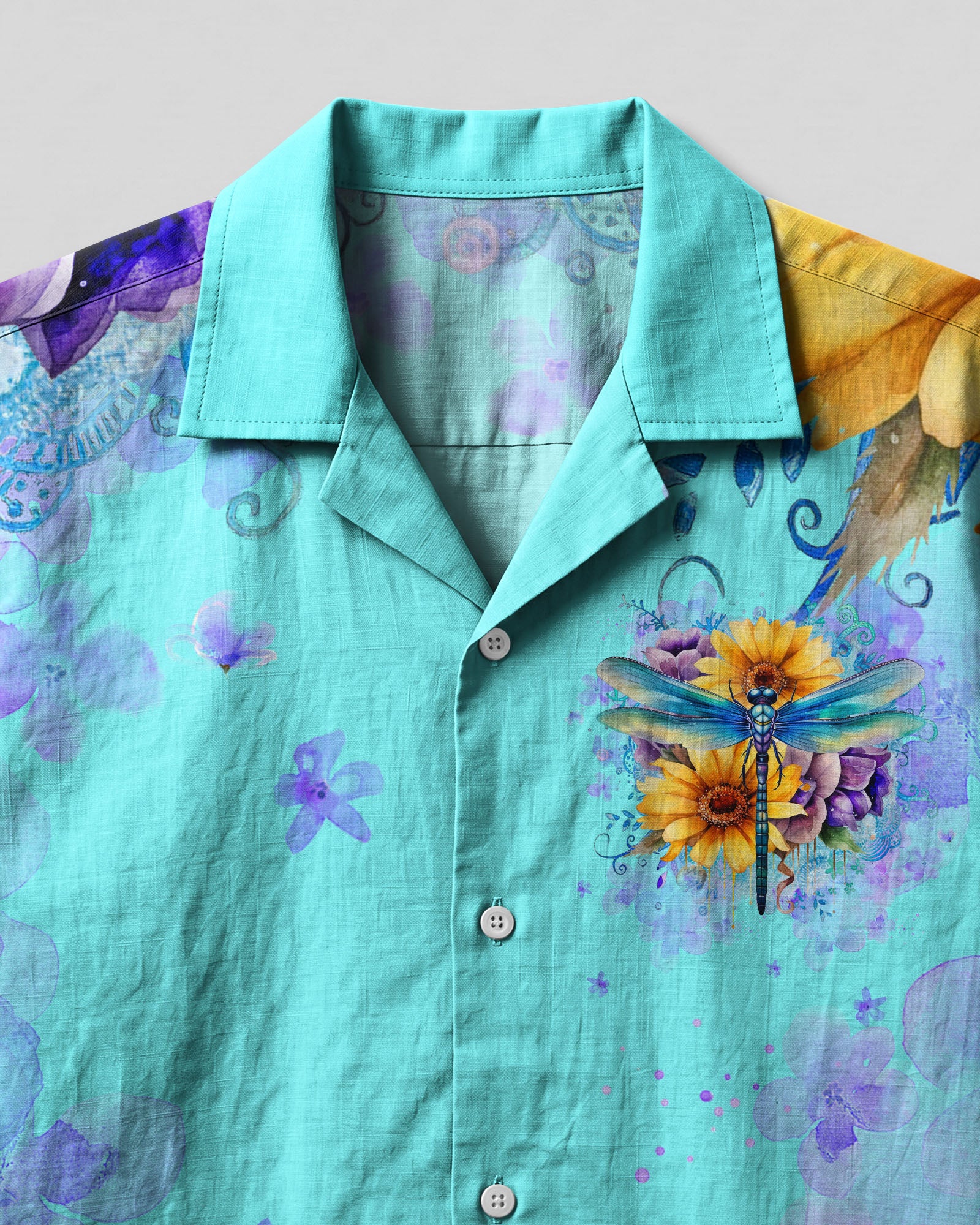 Just Breathe Dragonfly Camp Shirt Close-up detail of the just breathe dragonfly camp shirt highlighting the intricate flower and dragonfly artwork.