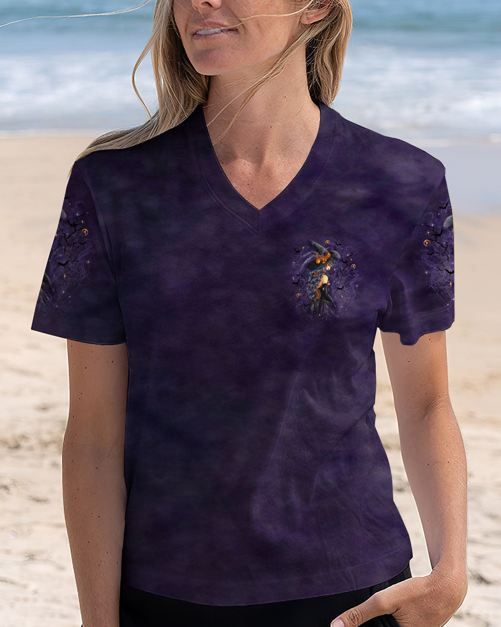 A Wee Bit Wicked Witch Shirt | All Over Print Side angle of the a wee bit wicked witch shirt, displaying the colorful graphics and relaxed fit.
