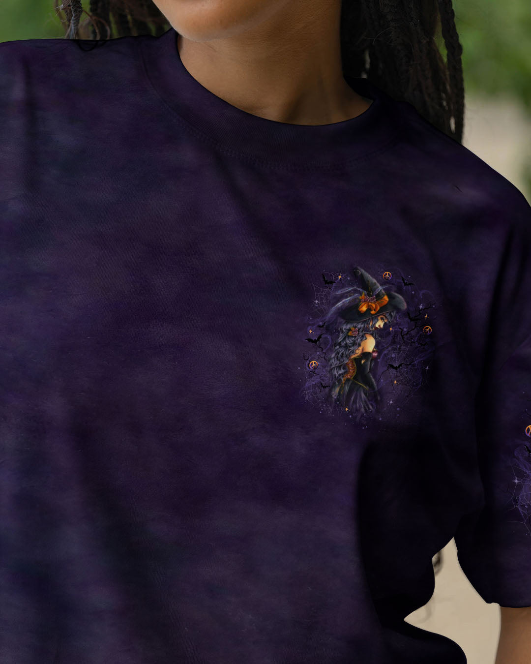 A Wee Bit Wicked Witch Shirt | All Over Print Back view showcasing the intricate details of the a wee bit wicked witch shirt featuring bats and webs.