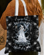 Front view of the spirit of a witch halloween tote bag featuring a mystical design in black and white.