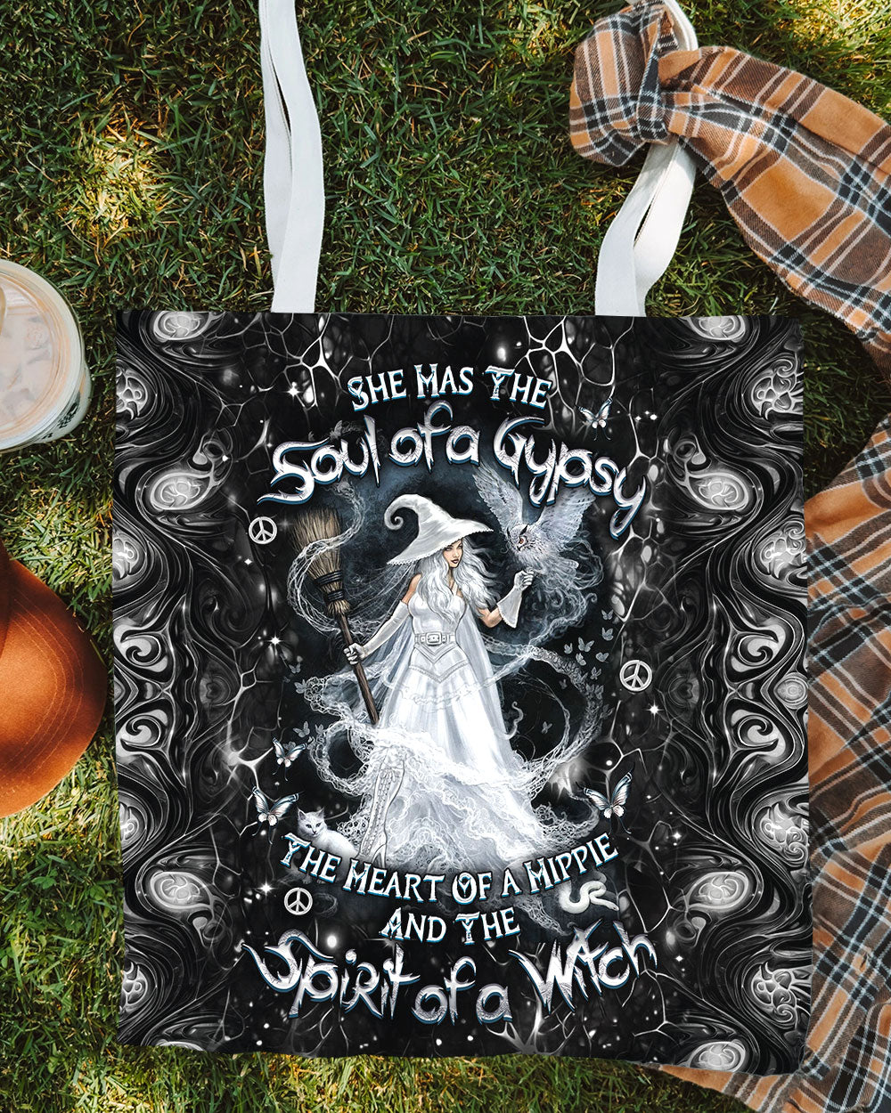 Spirit of a Witch Halloween Tote Bag Lifestyle shot of the spirit of a witch halloween tote bag being carried, showcasing its detailed artwork and straps.