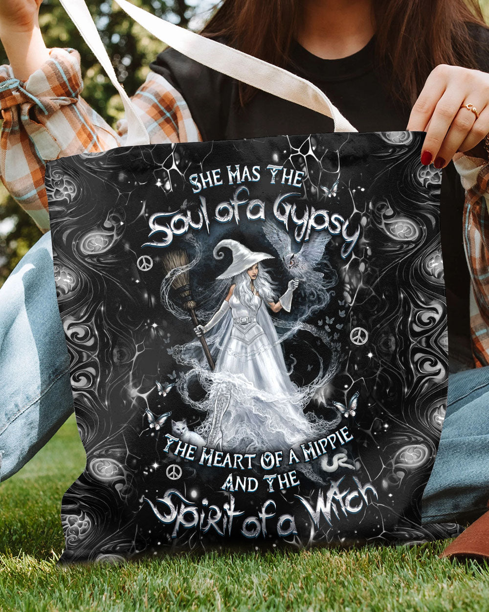 Spirit of a Witch Halloween Tote Bag Close-up of the spirit of a witch halloween tote bag's intricate design, highlighting the witch and swirling patterns.
