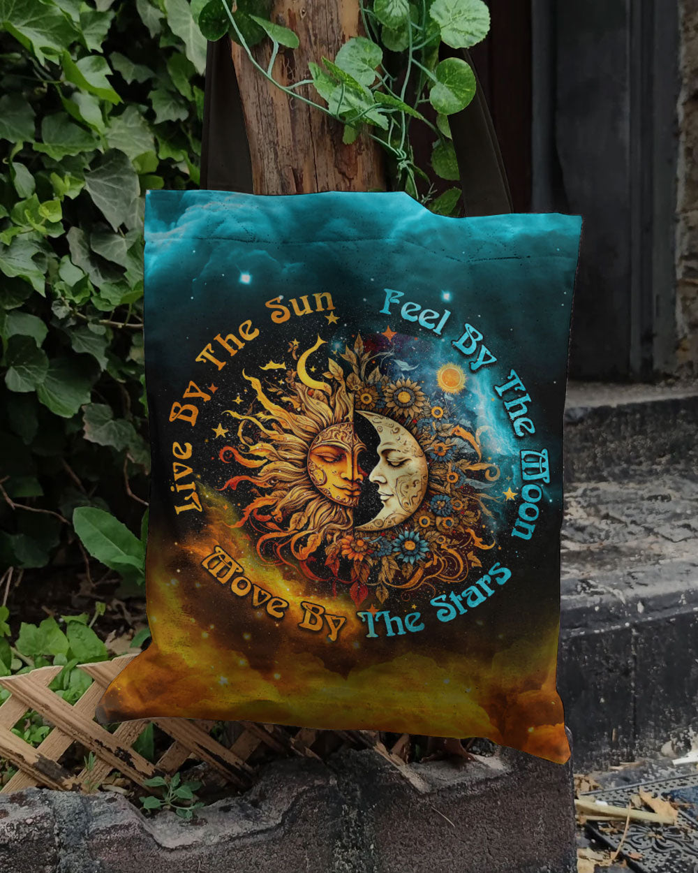 Live By The Sun Moon Stars Tote Bag Close-up detail of the live by the sun moon stars tote bag's intricate design, highlighting the sun and moon elements.