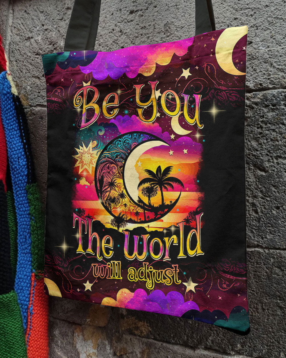 Be You The World Will Adjust Tote Bag Close-up of the BE YOU THE WORLD WILL ADJUST TOTE BAG highlighting the detailed artwork and bold text.