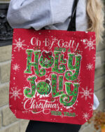 Front view of the red OH BY GOLLY CHRISTMAS TOTE BAG with festive lettering and snowflake designs.