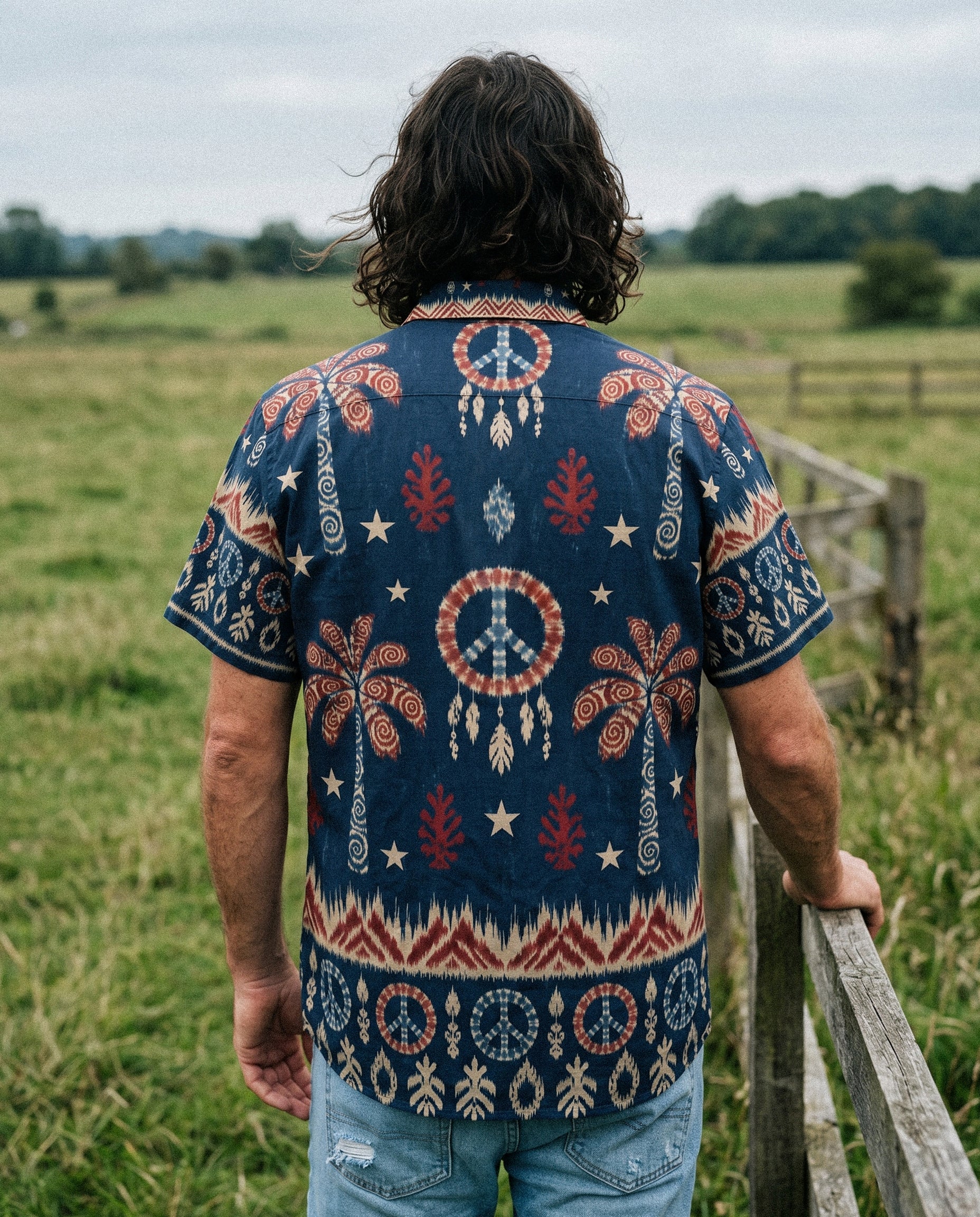 Peace Palm Ikat Button-Down Shirt Flat lay of the Peace Palm Ikat Button-Down Shirt against a light background, showcasing its vibrant design.