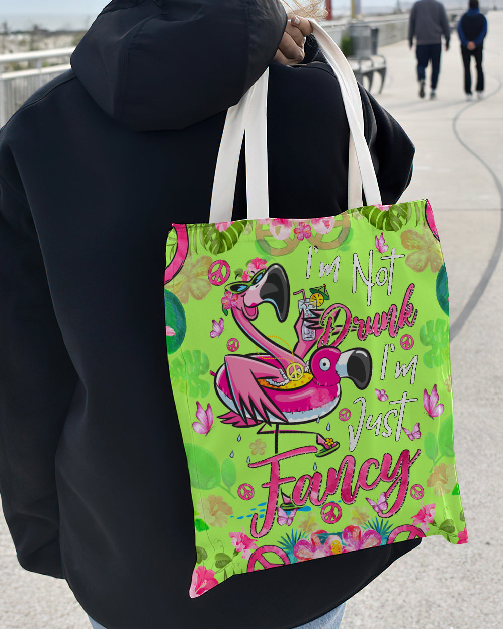 I'm Just Fancy Flamingo Tote Bag Back of I'm Just Fancy Flamingo Tote Bag showing colorful tropical patterns and whimsical text detail.