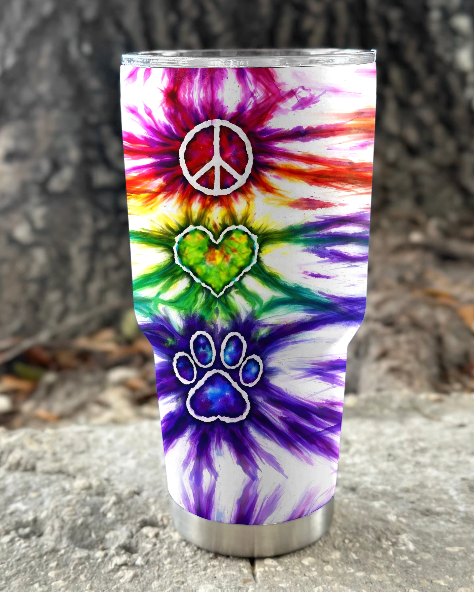 Peace Love Paw Print Swirl Tumbler Lifestyle shot of the peace love paw print swirl tumbler held outdoors, perfect for eco-conscious pet lovers.