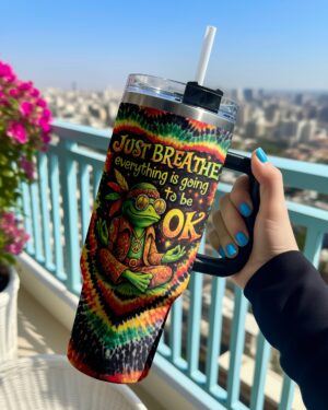 Front view of the Just Breathe Frog Swirl Tumbler with vibrant colors and a playful frog design.