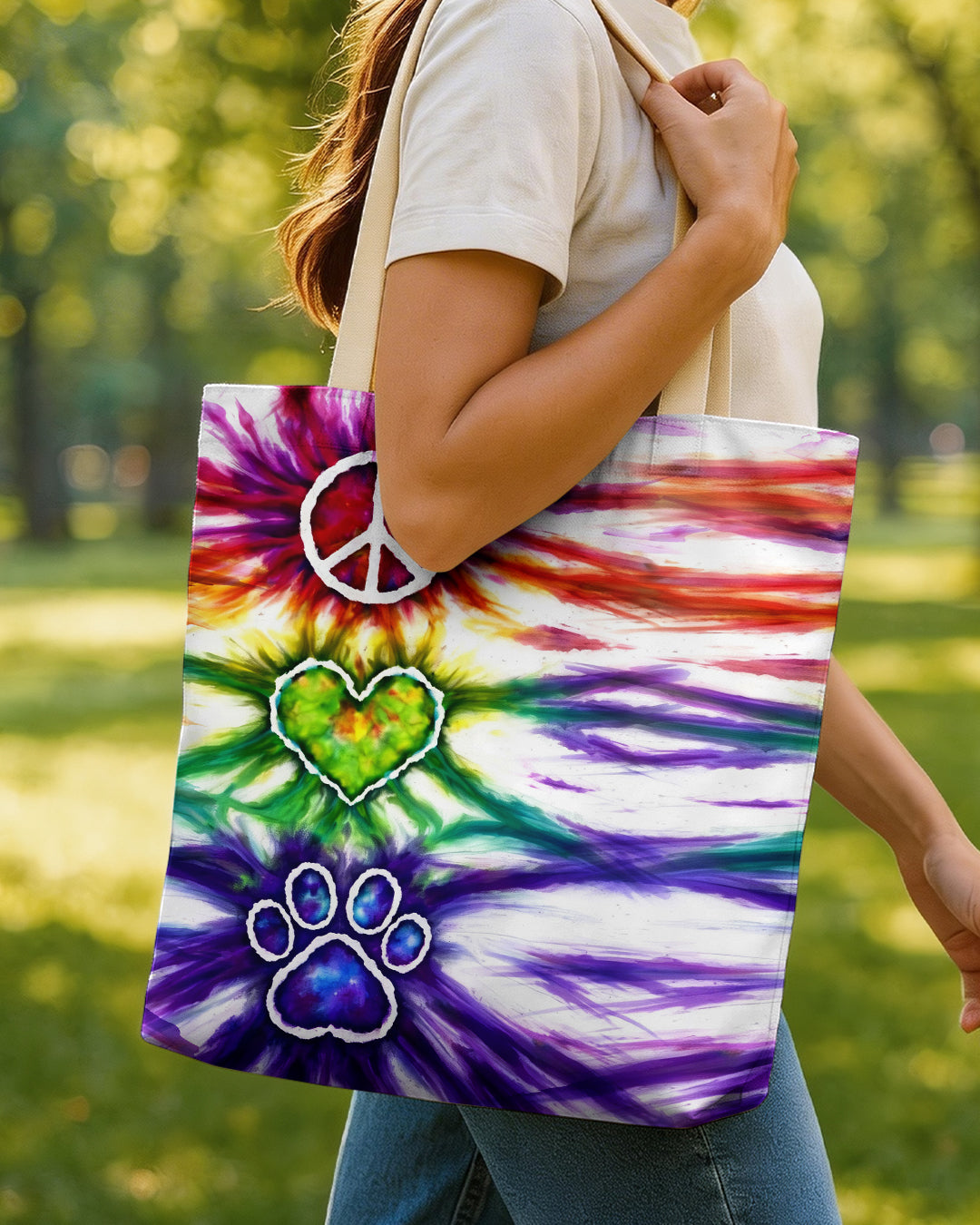 Peace Love Paw Print Swirl Tote Bag Vibrant peace love paw print swirl tote bag design showcased from the front, featuring colorful tie-dye patterns.