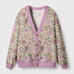 Front view of the Victorian floral cardigan sweater showcasing its vintage botanical design and soft purple trim.