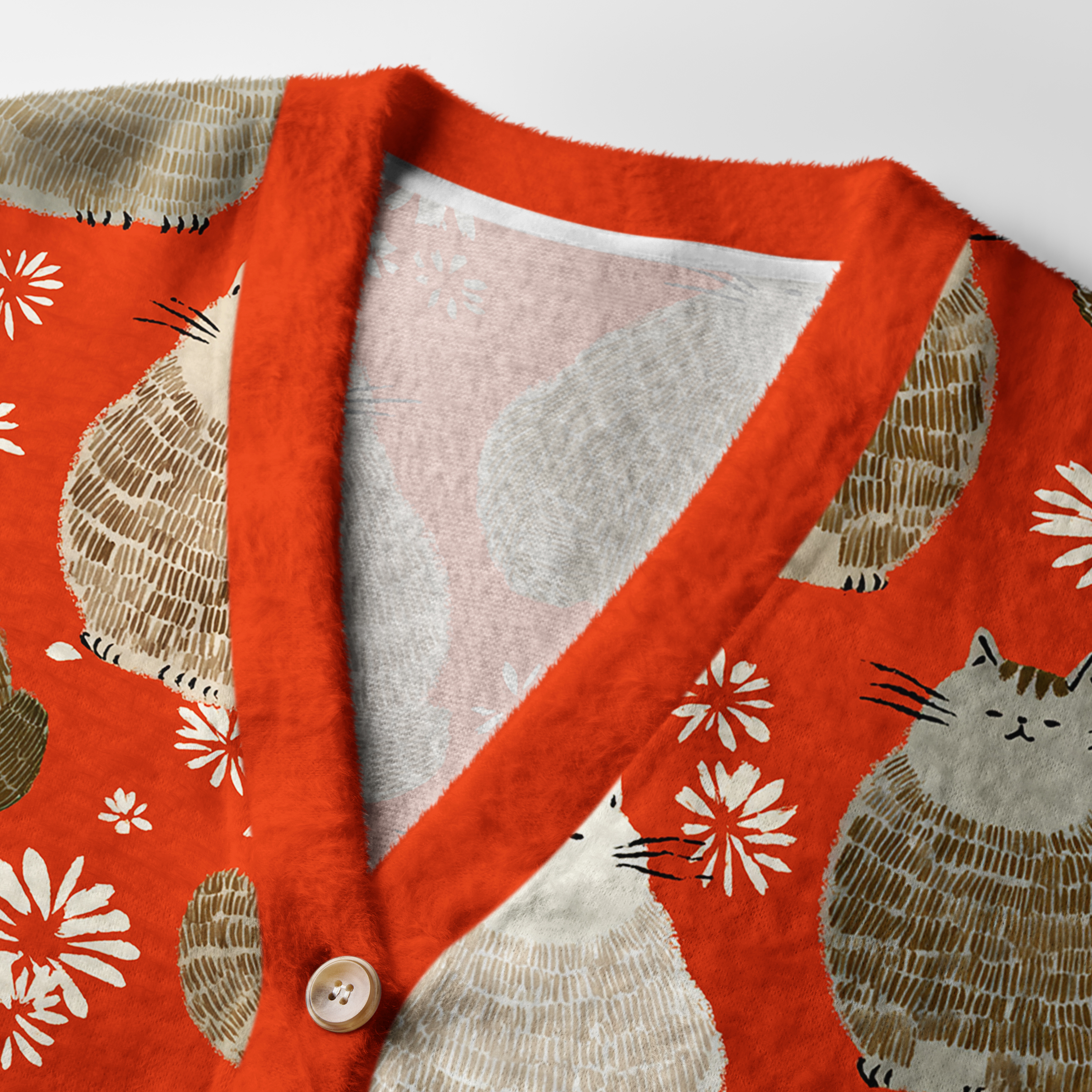 Fat Cat Cardigan Sweater | Funny Cat Design Close-up detail of the fat cat cardigan sweater highlighting the unique cat patterns and soft texture of the fabric.