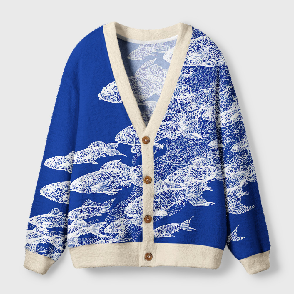 Blueprint of the Sea Cardigan Sweater Front view of the blueprint of the sea cardigan sweater featuring a vibrant blue color and intricate fish design.