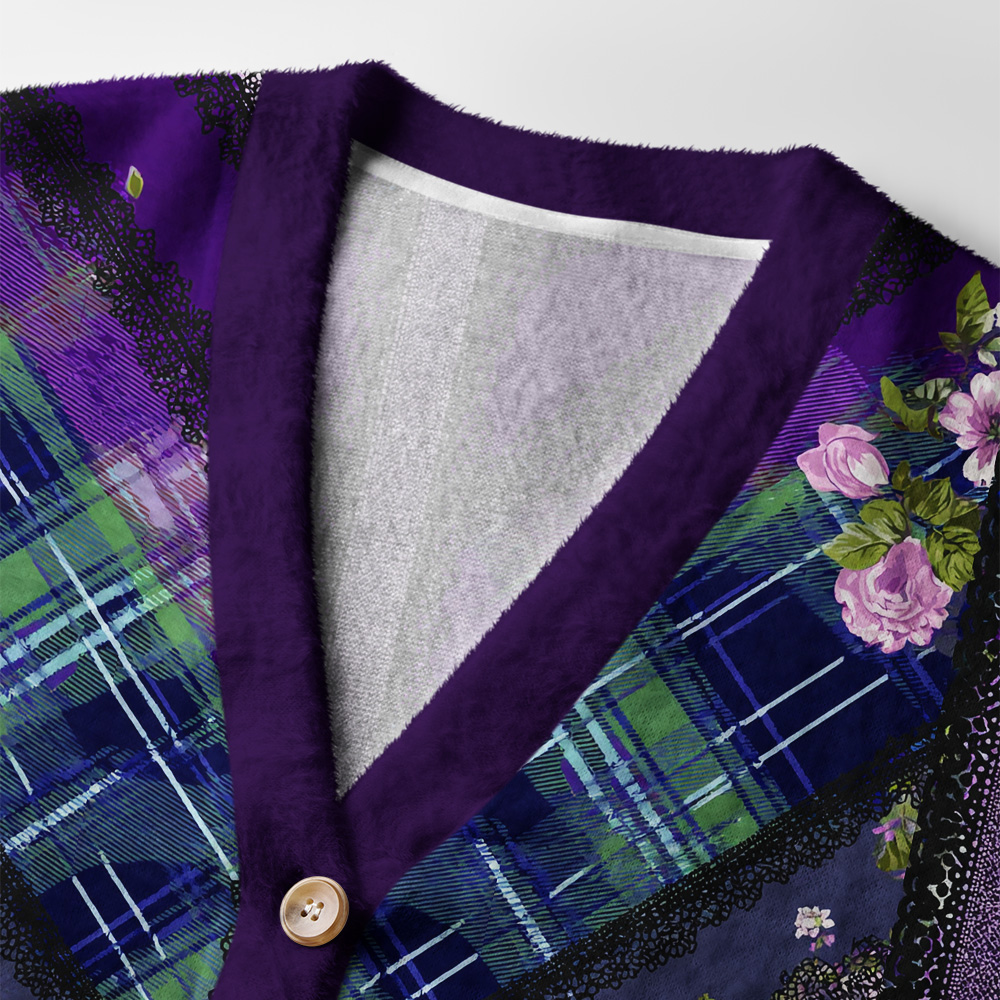 Rose & Lace Tartan Cardigan Sweater Close-up detail of the rose & lace tartan cardigan sweater highlighting the intricate floral and lace designs.