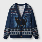 Front view of the yule cat cardigan sweater showcasing a black cat design against a navy blue background.