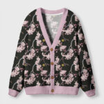 Front view of the sakura breeze cardigan sweater featuring a black base with pink floral design and soft trim.