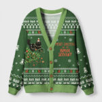 Front view of the funny Christmas cat cardigan in green, featuring a whimsical cat design and festive text.