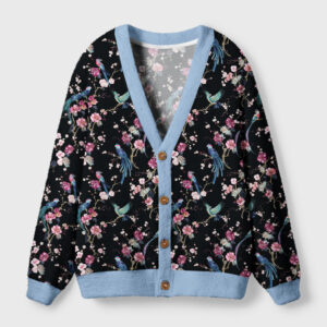 Front view of the Birds & Blooms cardigan sweater featuring a black floral bird design and soft blue trim.