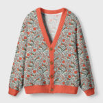 Front view of the winter blossoms & birds cardigan sweater featuring vibrant floral patterns and an orange trim.