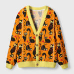 Front view of the prowling cats cardigan sweater featuring a bold orange color and playful cat designs.