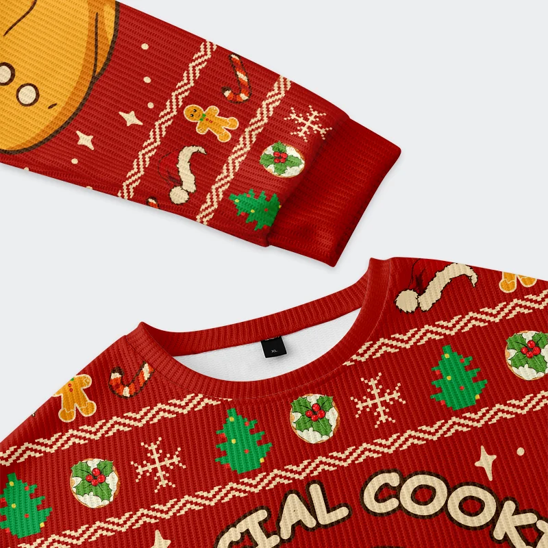 Official Cookie Taste Tester Christmas Ugly Sweatshirt Close-up of the official cookie taste tester sweatshirt fabric, highlighting the vibrant red color and playful Christmas grap