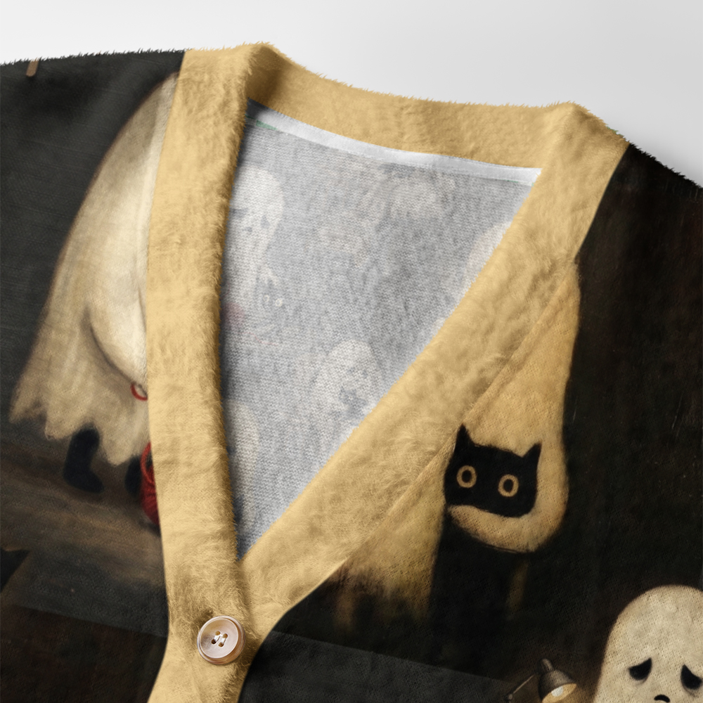 No Hope But a Cat Cardigan Sweater Close-up detail of the no hope but a cat cardigan sweater's buttons and unique cat illustrations on soft fabric.