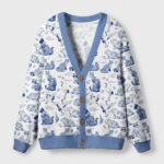 Floral animals cardigan sweater in blue featuring a whimsical animal print, front view with button details.