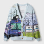 Front view of the black cat on the train cardigan featuring a whimsical Japanese cat design and vibrant colors.