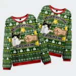 Front view of the most pawsome cat mom and dad sweatshirt in green, featuring a fun cat design and holiday motifs.