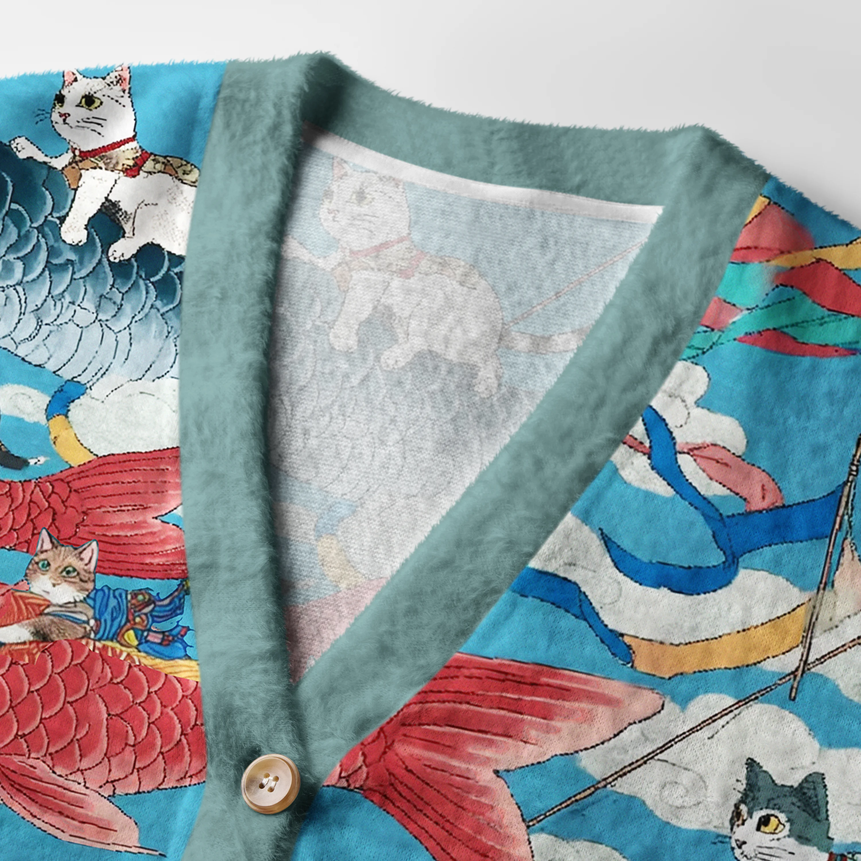Cats and Carp Flags Cardigan Sweater Close-up detail of the cats and carp flags cardigan sweater's fabric, highlighting the intricate Japanese cat design.