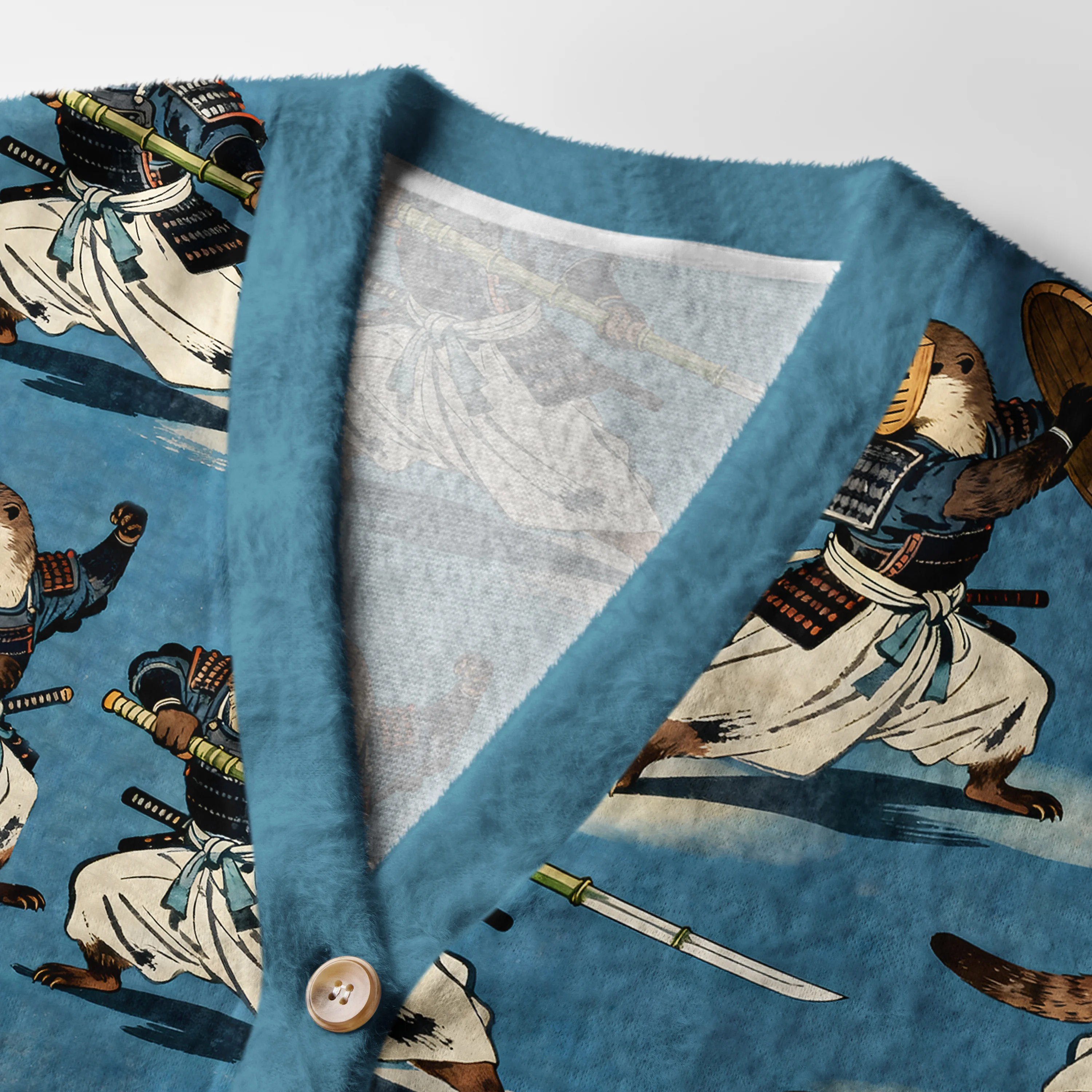Otter Samurai Cardigan Sweater | Japanese Animal Design Close-up detail of the otter samurai cardigan sweater's buttons and fabric texture, highlighting the unique design.