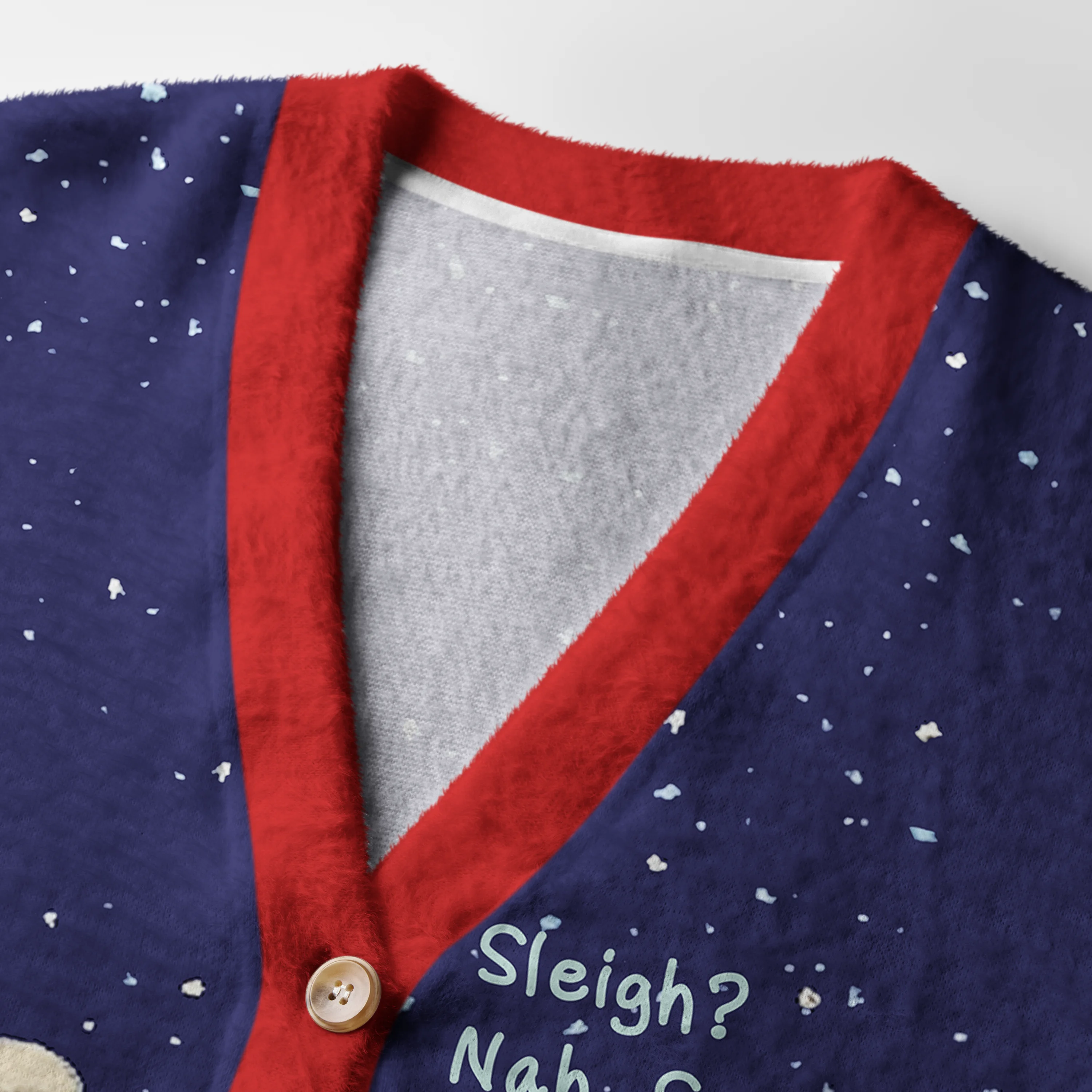 Santa High-Speed Holiday Cardigan Close-up of the Santa high-speed holiday cardigan's buttons and soft fabric showcasing its funny Christmas design.