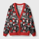 Front view of the enchanted red black village cardigan featuring vibrant village art and bold red trim.