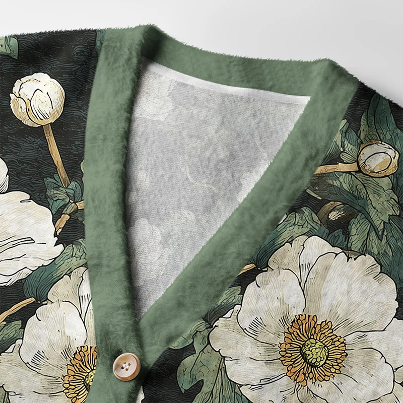 Japanese Epiphyllum Cardigan Sweater Close-up detail of the Japanese Epiphyllum cardigan sweater highlighting the vibrant floral design and button accents.