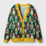 Front view of the nutcracker parade cardigan sweater featuring a colorful nutcracker design on a green background.